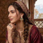 dark green stone kashmiri earrings on woman