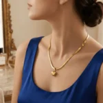 serpentine gold chain with heart pendant