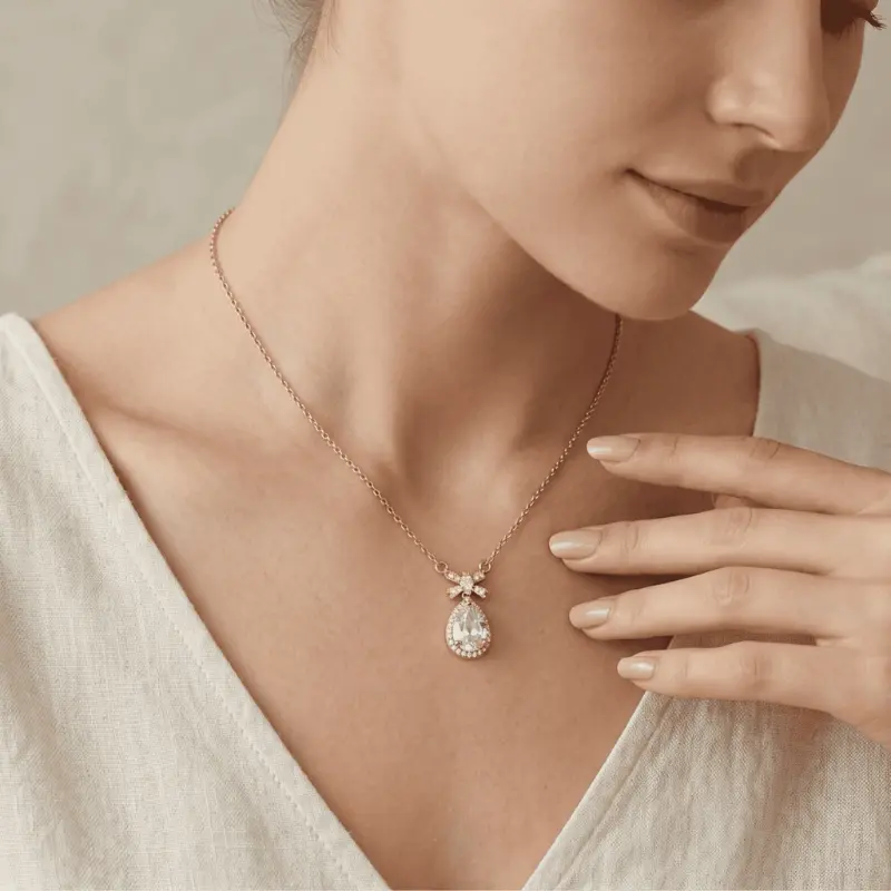 crystal teardrop bow pendant