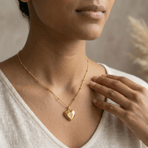 artificial gold chain with cz studded heart pendant