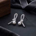 Fashion White Tone Ribbon Knot Pearl Stud Earrings for Women and Teen Girls, Elegant Crystal Rhinestone Bow Jewelry - Image 4