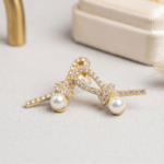 Fashion Gold Tone Ribbon Knot Pearl Stud Earrings for Women and Teen Girls, Elegant Crystal Rhinestone Bow Jewelry - Image 5